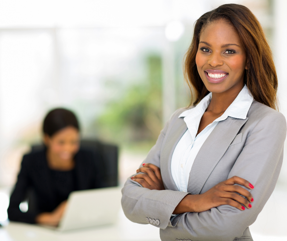 Smiling leader with hands folded